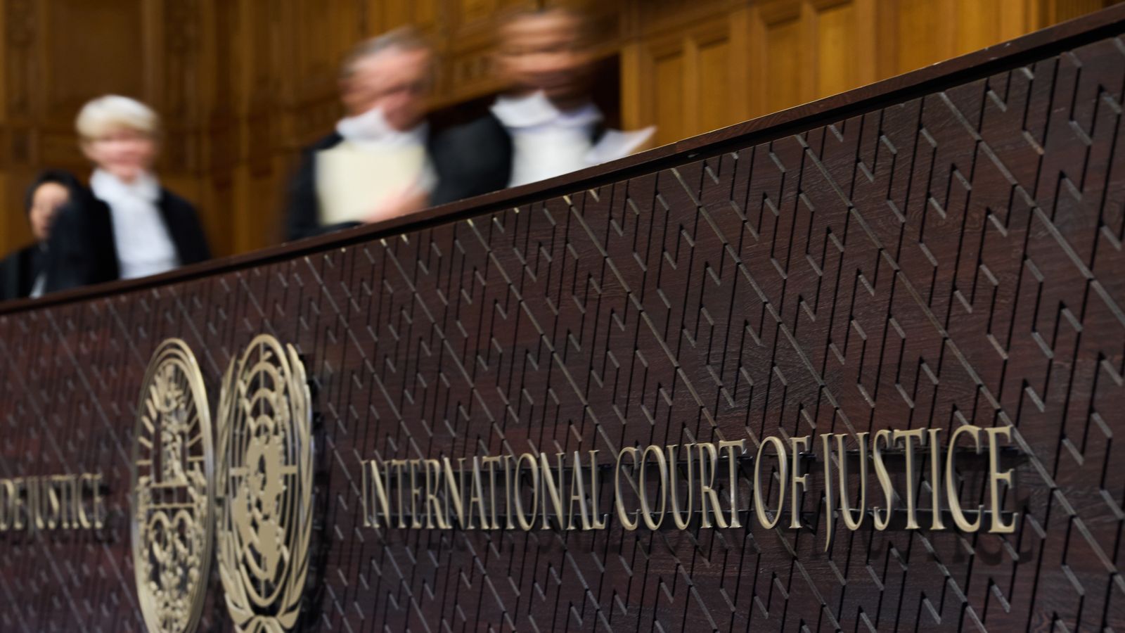 Judges walk to their seats before reading the advisory opinion of the ICJ on what Israel must do to ensure humanitarian aid reaches Palestinians. Pic: AP