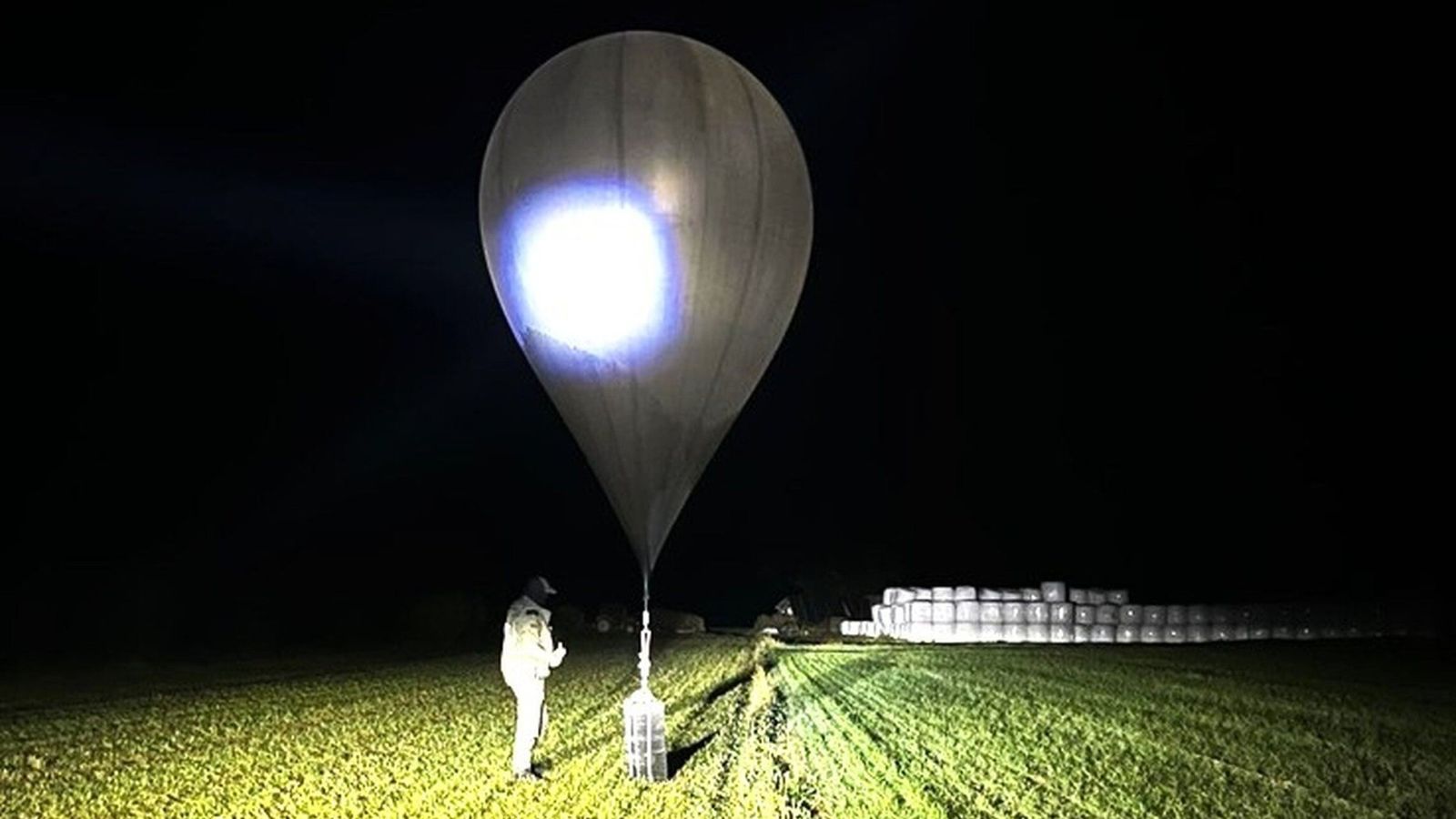Lithuania's State Border Guard Service intercepts a balloon carrying contraband cigarettes. AP file pic