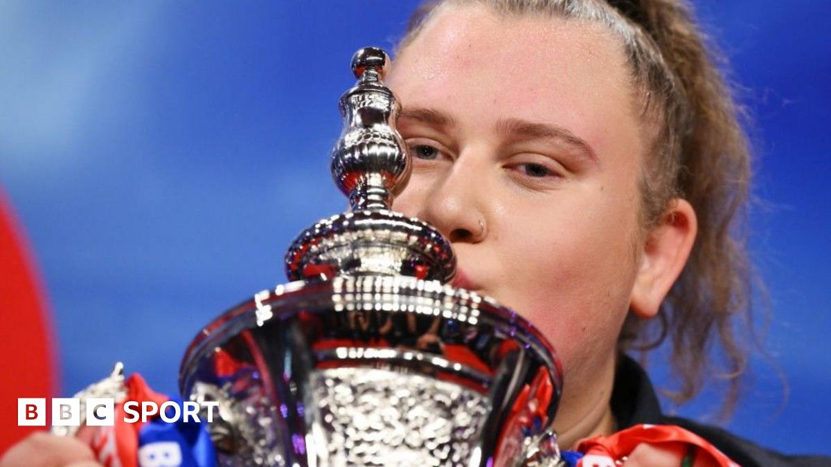 Beau Greaves with the Women's World Matchplay trophy in 2024