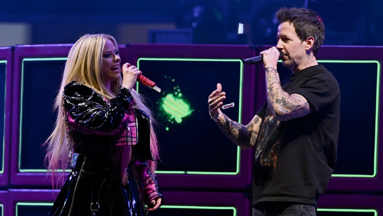 Avril Lavigne and Pierre Bouvier of Simple Plan perform at When We Were Young in Las Vegas.