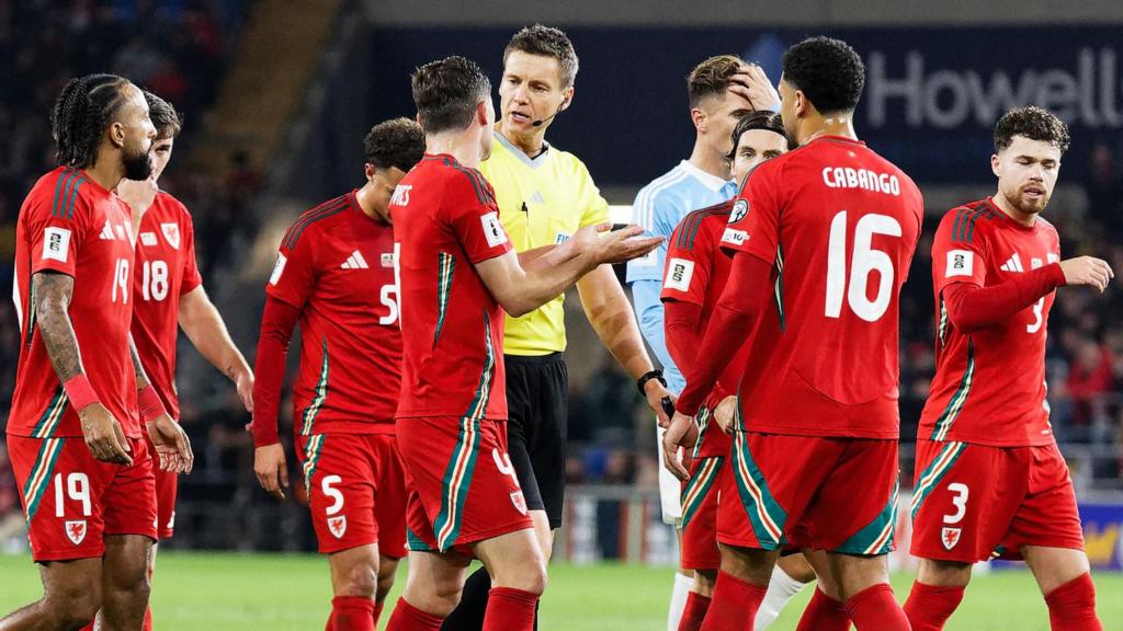 Wales players protest penalty award