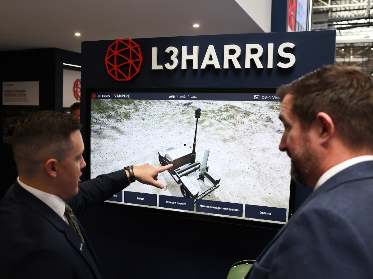 Representatives present a defense system at the L3Harris stand during the 33rd International Defence Industry Exhibition (MSPO) in Kielce, Poland, on September 2, 2025.