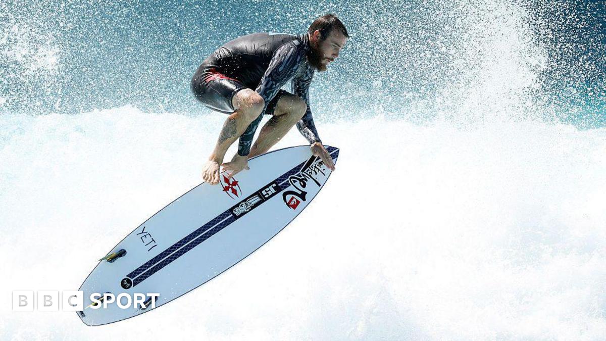 Mikey Wright performs an aerial manoeuvre on a surfboard during the Stab High Sydney in Australia