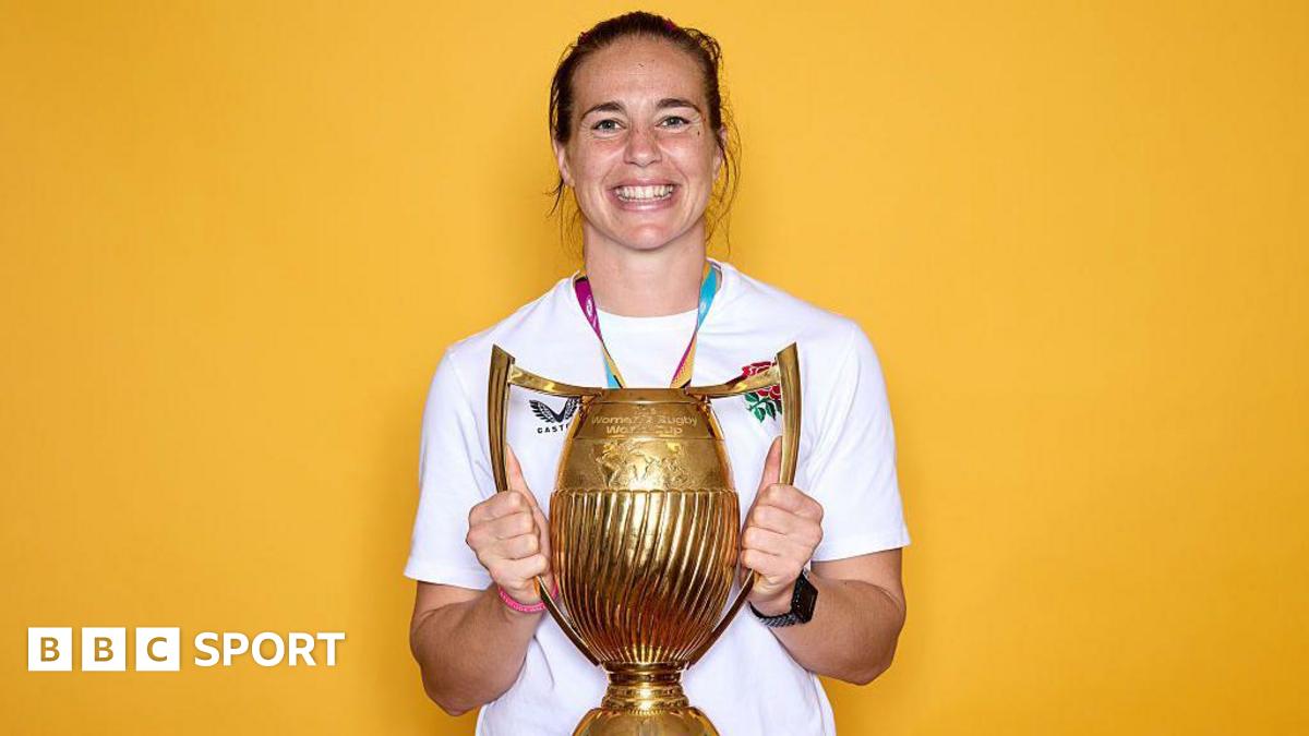 Emily Scarratt holds the Rugby World Cup