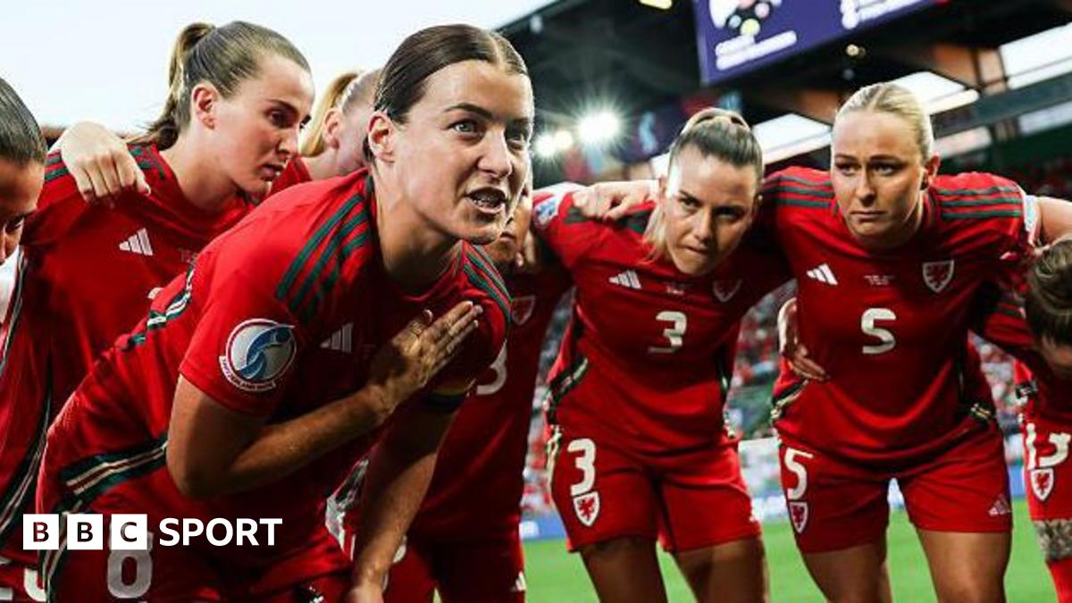 Wales captain Angharad James speaks to her team-mates (L-R: Carrie Jones, Gemma Evans, Rhiannon Roberts) prior to the Euro 2025 match against England