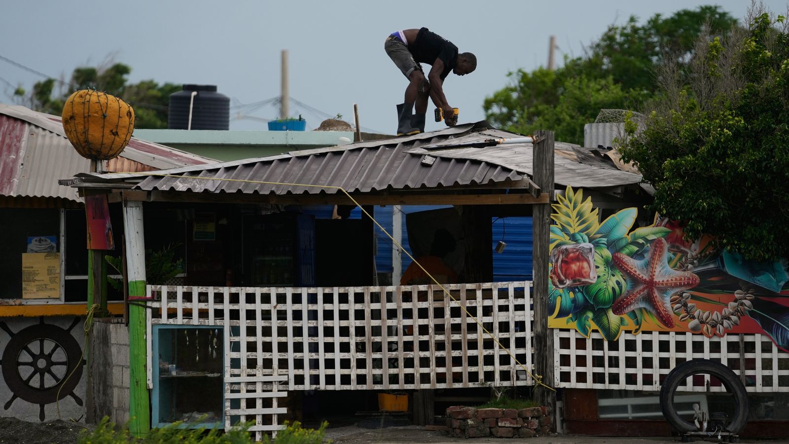 Preparing for Hurricane Melissa's touchdown. Pic: AP