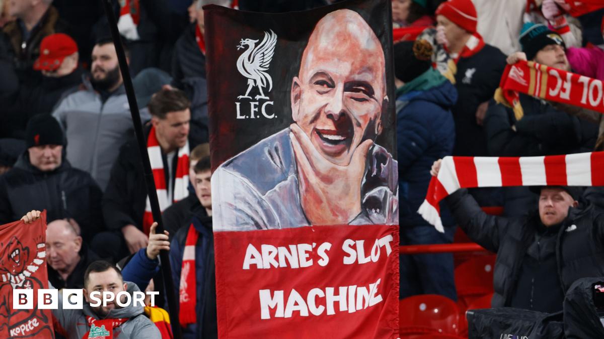 A banner showing Bill Shankly, Bob Paisley, Joe Fagan, Kenny Dalglish, Rafael Benitez, Jurgen Klopp and Arne Slot