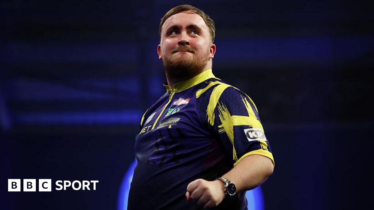Luke Littler celebrates beating Mike de Decker at the World Grand Prix