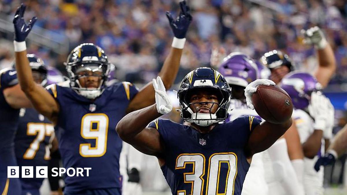 Kimani Vidal celebrates a touchdown for the Los Angeles Chargers against the Minnesota Vikings