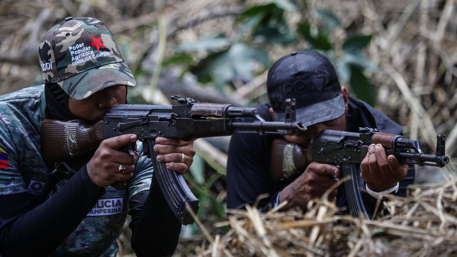 In Venezuela, the government has civilians trained in the use of weapons to defend the country in the event of a US attack. Pic: AP