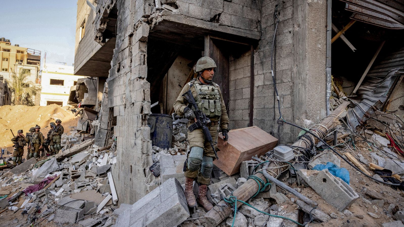 Israeli soldiers stand amid rubble in the northern Gaza Strip, November 8, 2023. File pic: Reuters