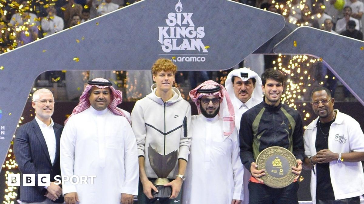 Jannik Sinner holds the Six Kings Slam trophy after his victory over Carlos Alcaraz in the 2024 final