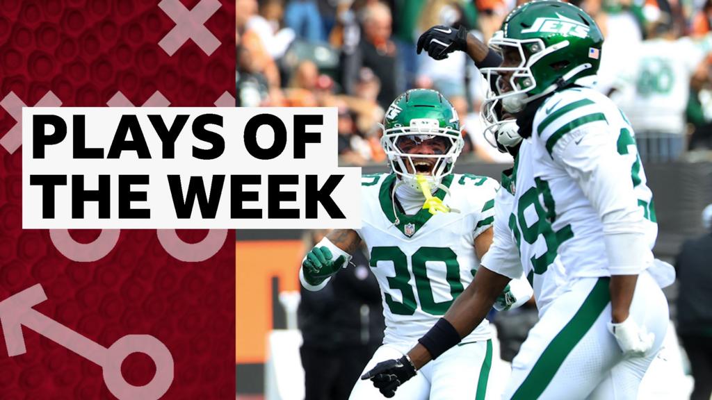 New York Jets players celebrate their first win of the season