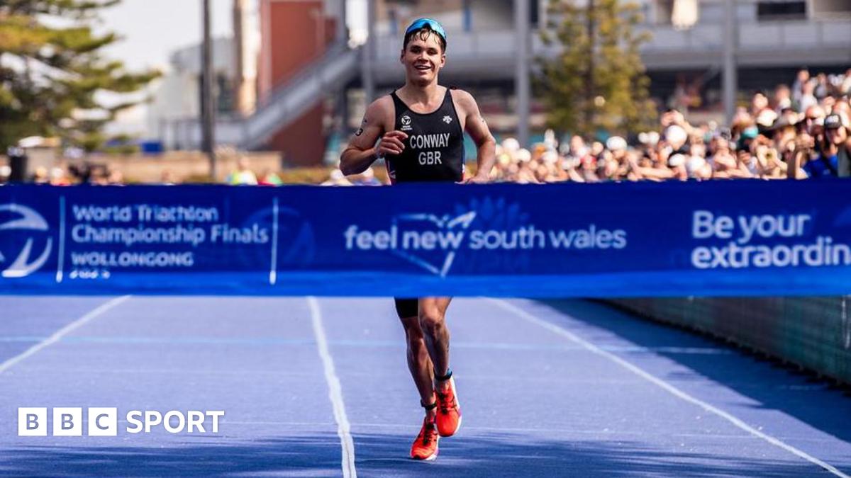 Great Britain's Oliver Conway crossing the finish line in first