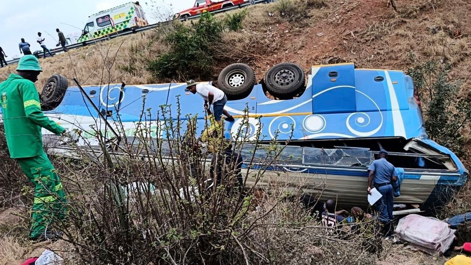 Emergency services at the scene of the bus crash in Louis Trichardt. Pic: South African Department of Transport and Community Safety via AP