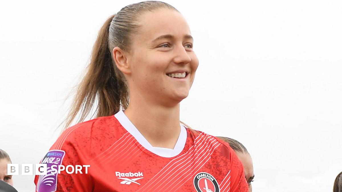 Mia Ross walks on to the pitch with Charlton Athletic