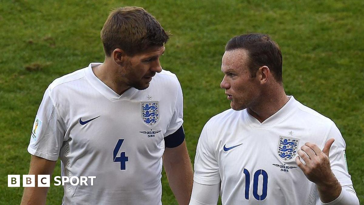 Steven Gerrard and Wayne Rooney talk after a 2014 World Cup game against Costa Rica