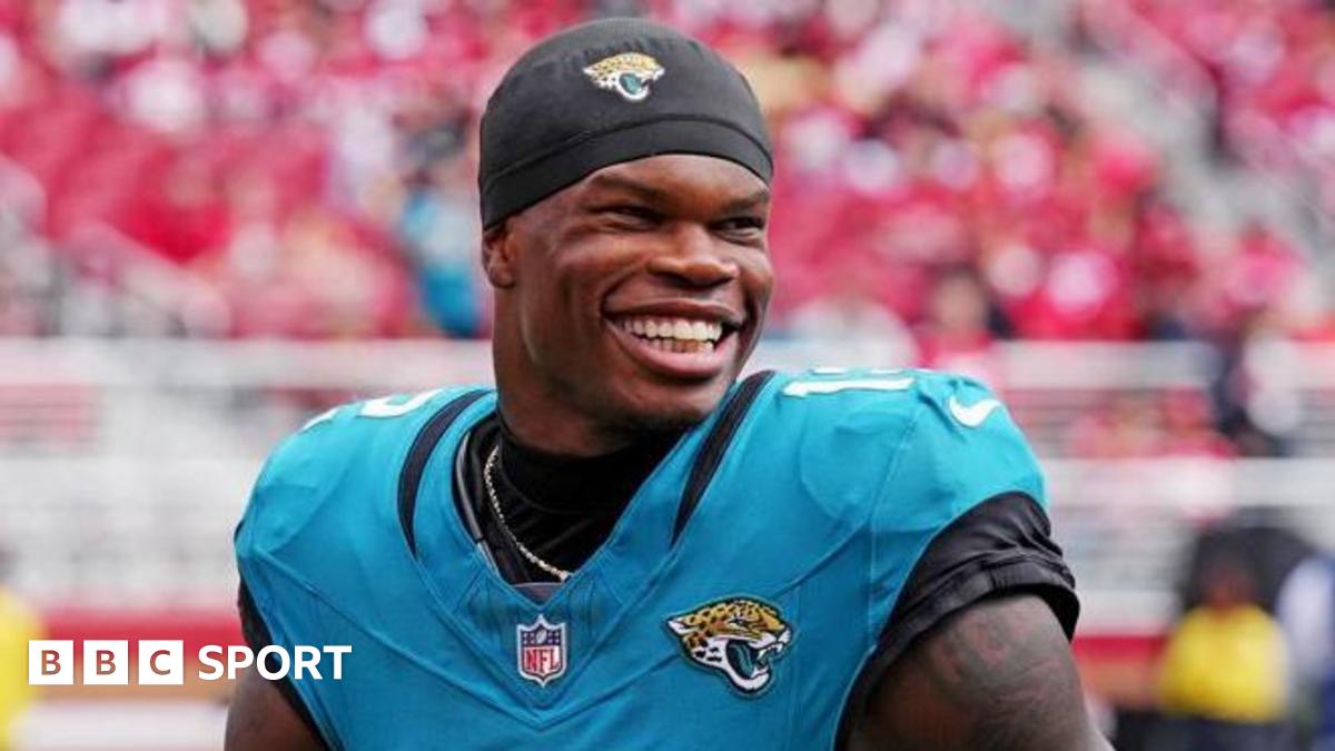Travis Hunter smiles after the Jacksonville Jaguars' win at the San Francisco 49ers