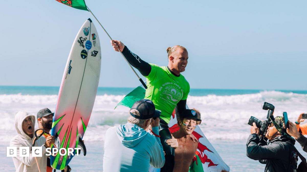 Llywelyn 'Sponge' Williams is held aloft after his win