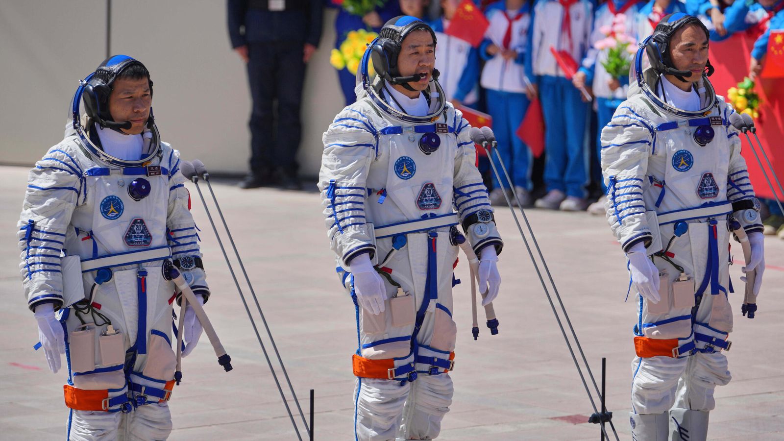 Chinese astronauts (L-R) Wang Jie, Chen Dong and Chen Zhongrui. File pic: AP