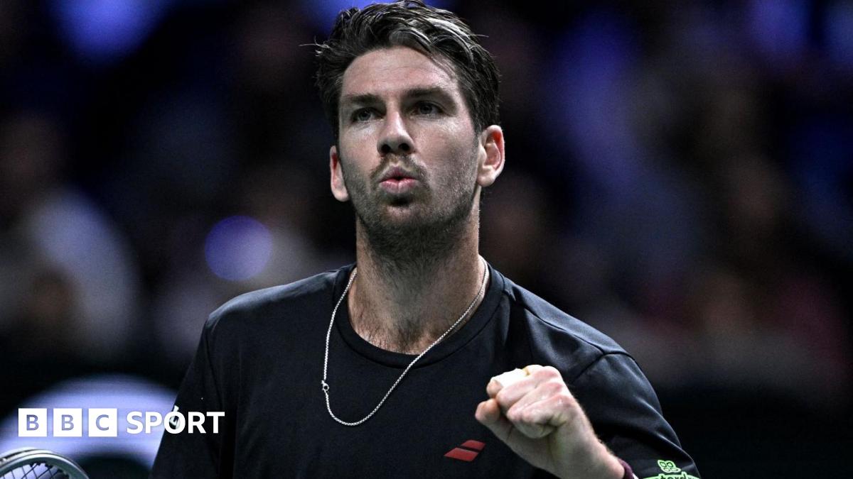 Cameron Norrie punches the air