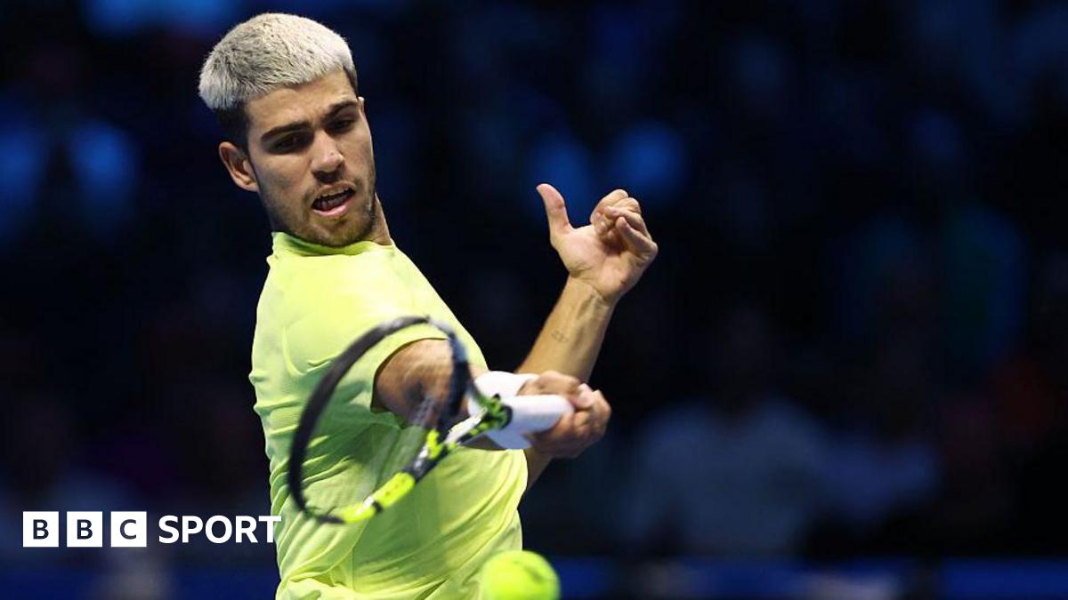 Carlos Alcaraz hits a forehand during the ATP Finals in Turin