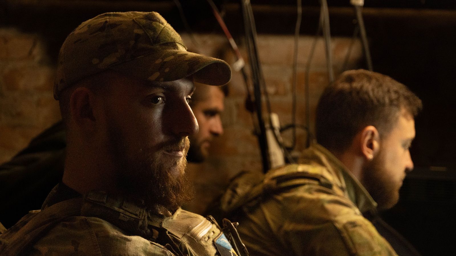 Betsik observes the work of the team on in the cellar