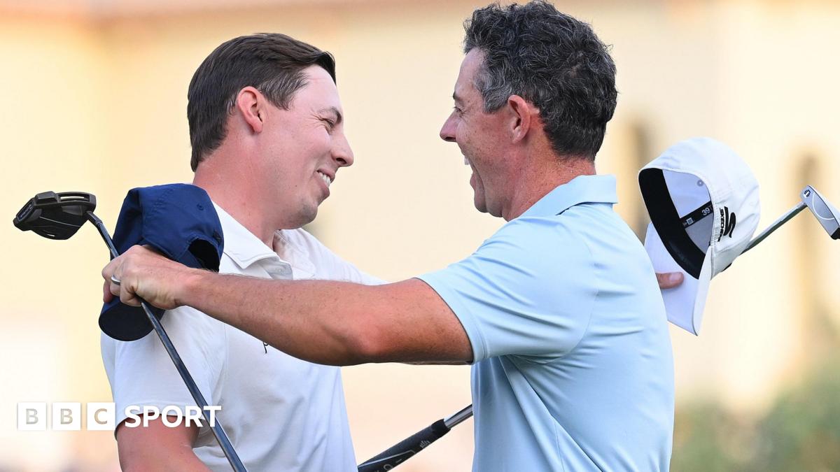 Matt Fitzpatrick and Rory McIlroy embrace after the Englishman defeated the Northern Irishman in a play-off to win the DP World Tour Championship.