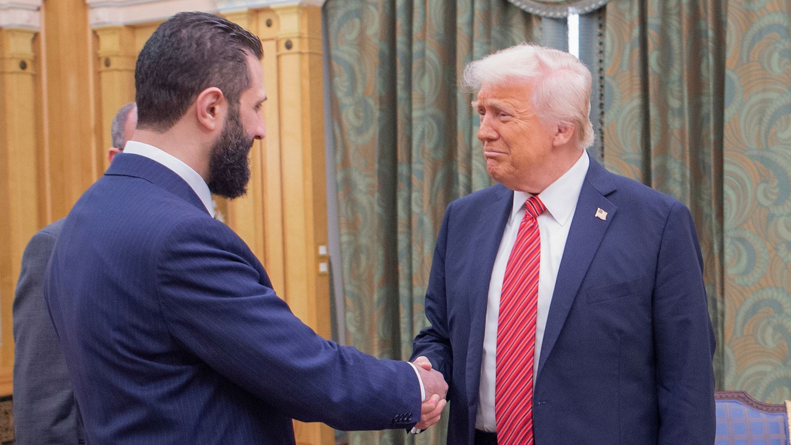 Ahmed al Sharaa meeting Donald Trump in Riyadh in May. Pic: AP