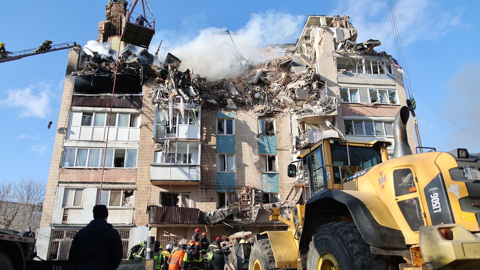 Rescue workers clear rubble after a Russian strike on Ternopil, Ukraine. Pic: AP
