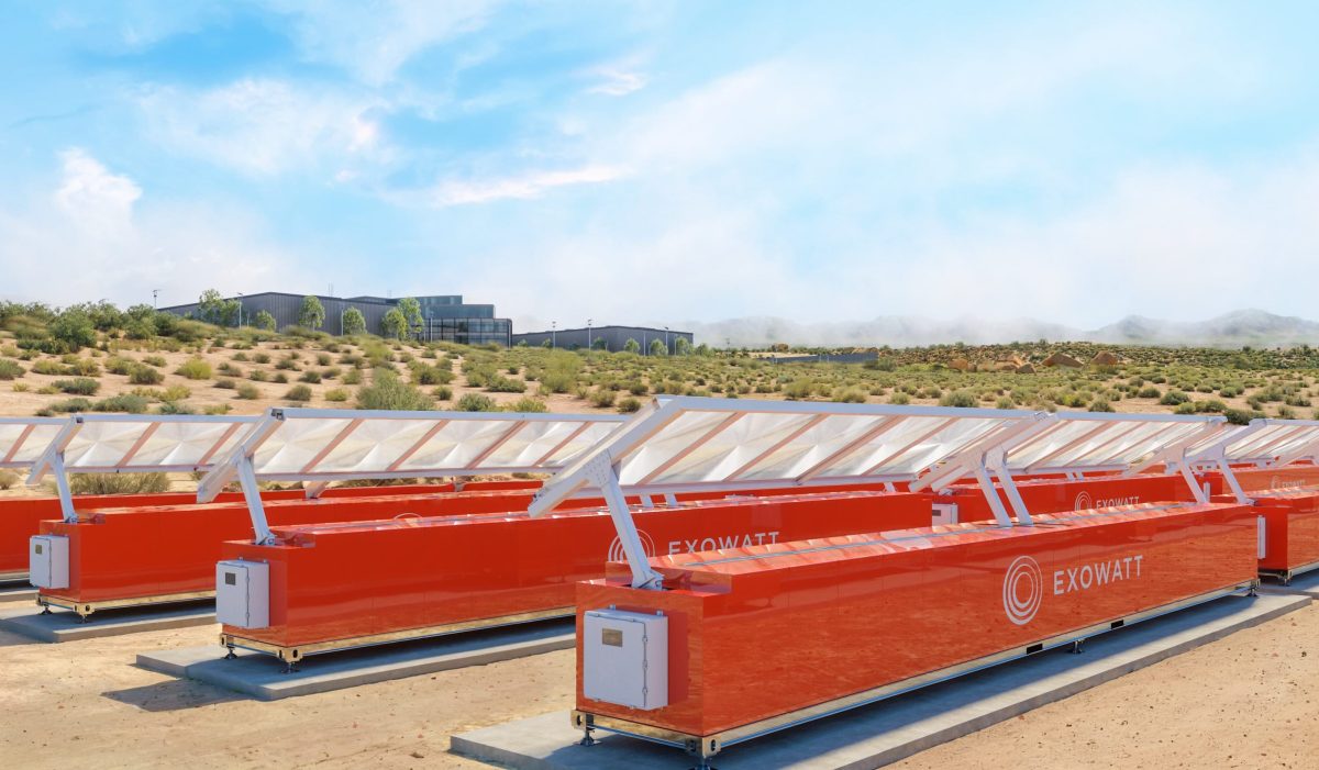 Exowatt's orange P3 units sit on sandy ground near a data center.