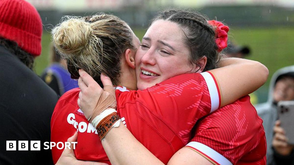 Gwen Crabb hugs Kelsey Jones after a Wales defeat