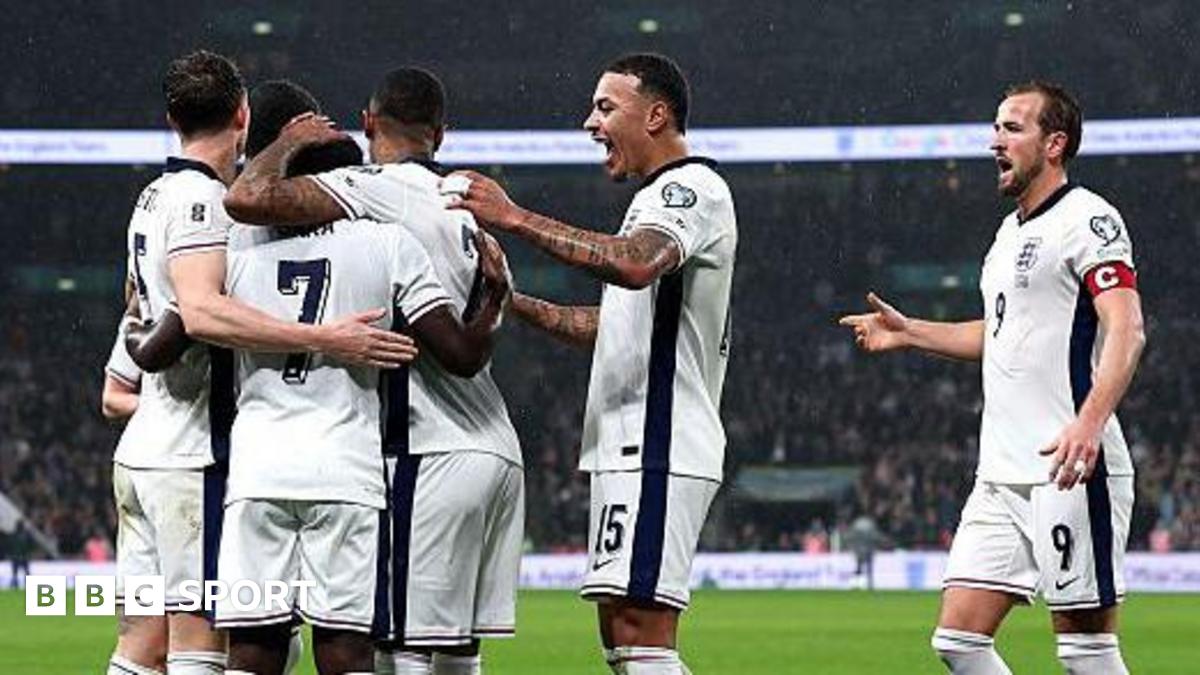 The England players celebrate together after Bukayo Saka's goal.