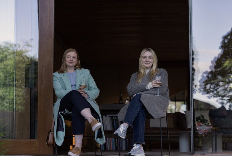 Sarah Snook as Marissa Irvine with Dakota Fanning as Jenny Kaminski.