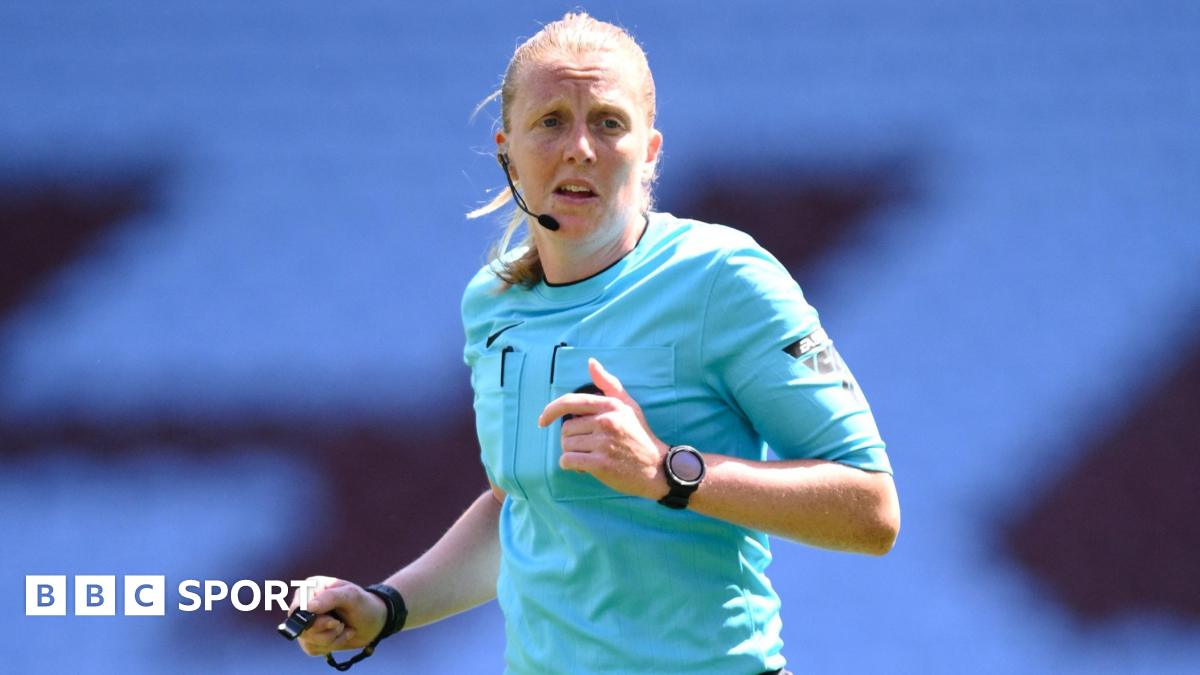 Lisa Benn refereeing a match