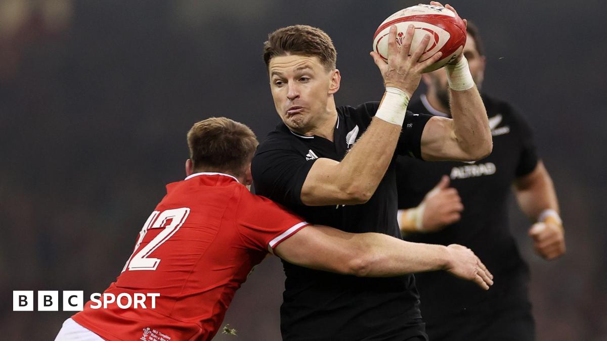 Beauden Barrett of New Zealand is tackled by Nick Tompkins of Wales