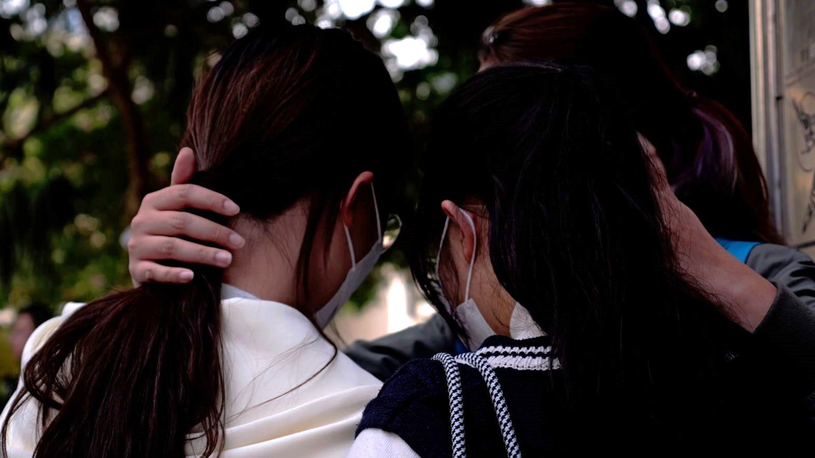 Mourning residents outside Wang Fuk Court