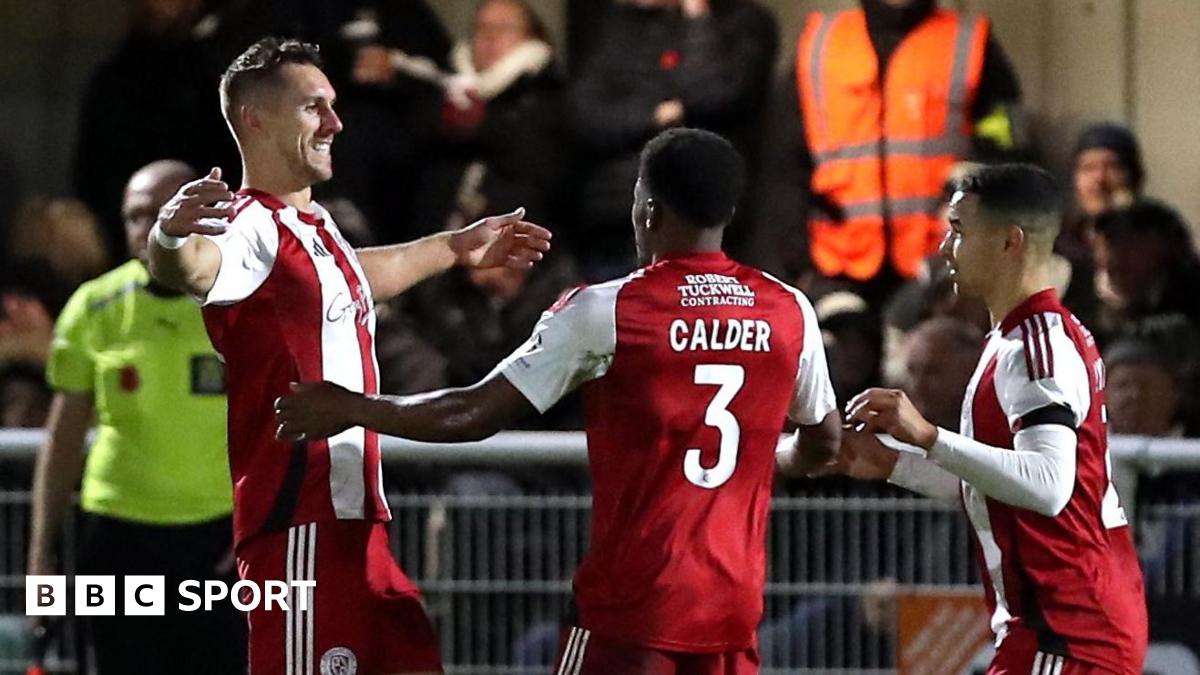 Brackley Town players celebrate at goal against Notts County