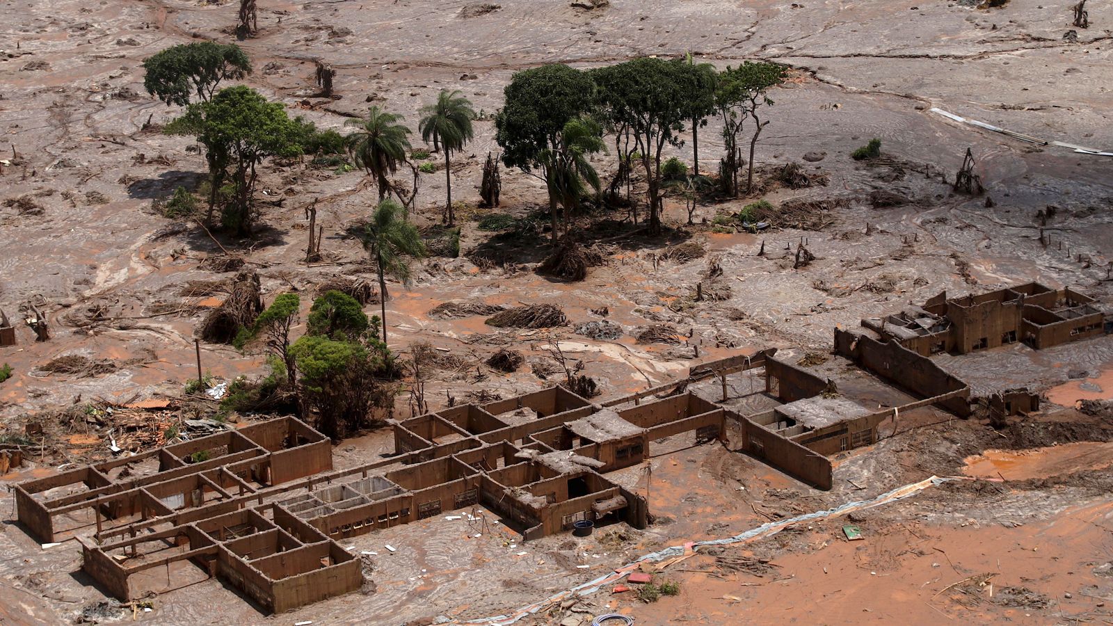 A school covered in mud after the 2015 Fundao dam collapse in Mariana, Brazil. Pic: Reuters