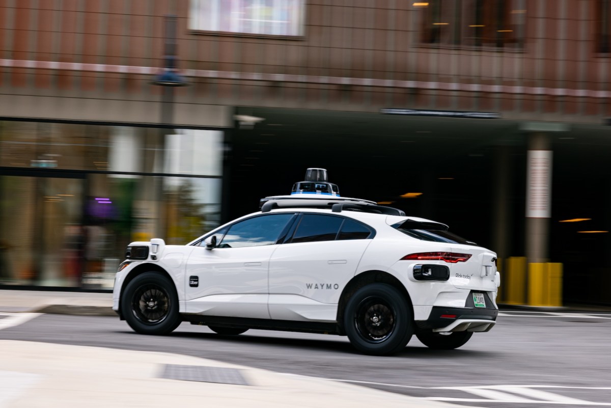 A white Waymo vehicle