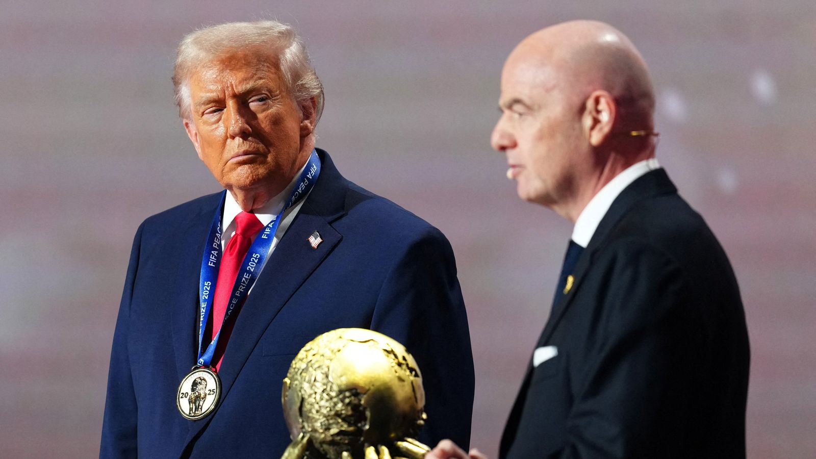 US President Donald Trump receives the FIFA Peace Prize. Pic: Reuters