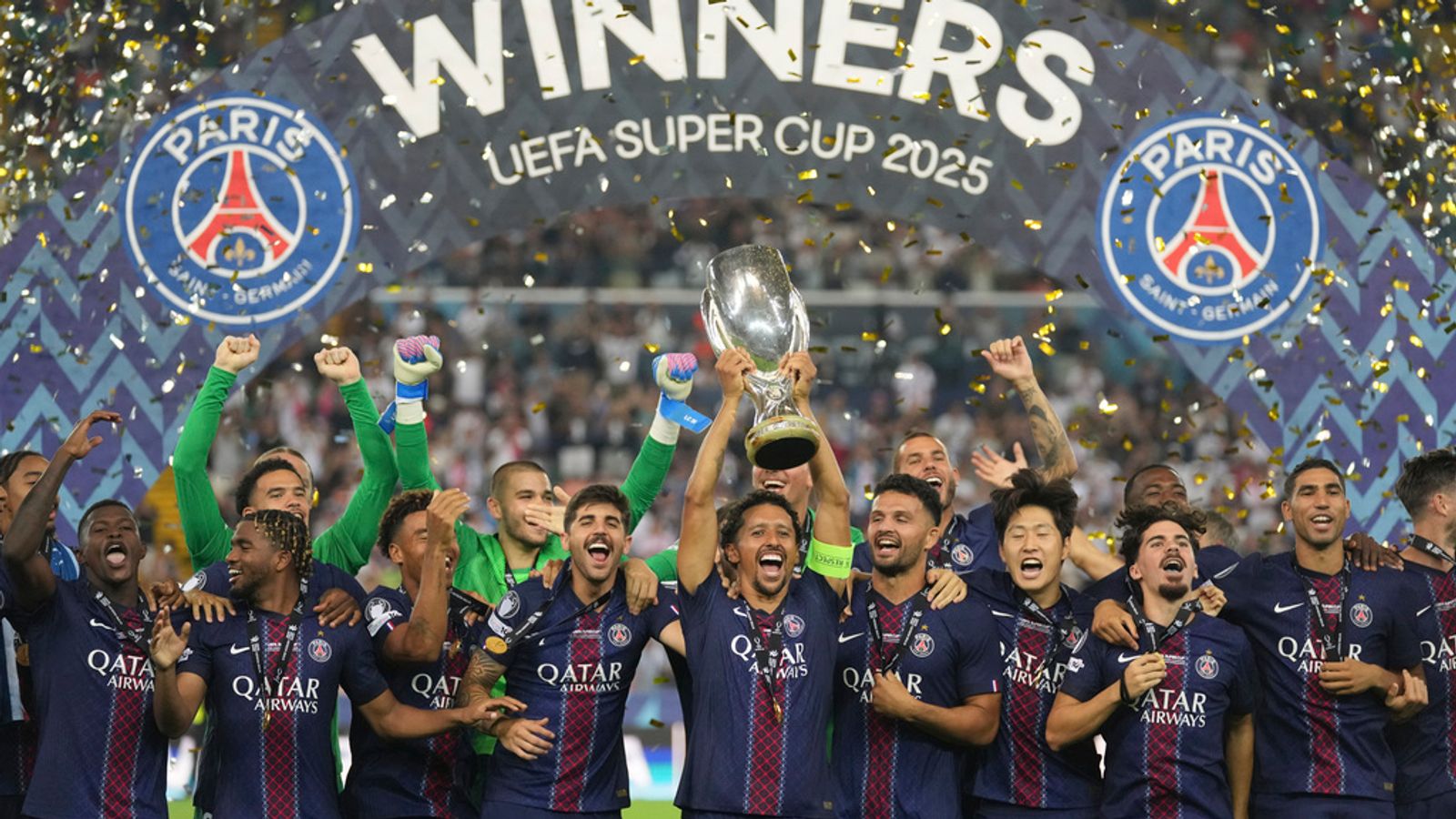 PSG's Marquinhos lifts the UEFA Super Cup trophy. Pic: AP