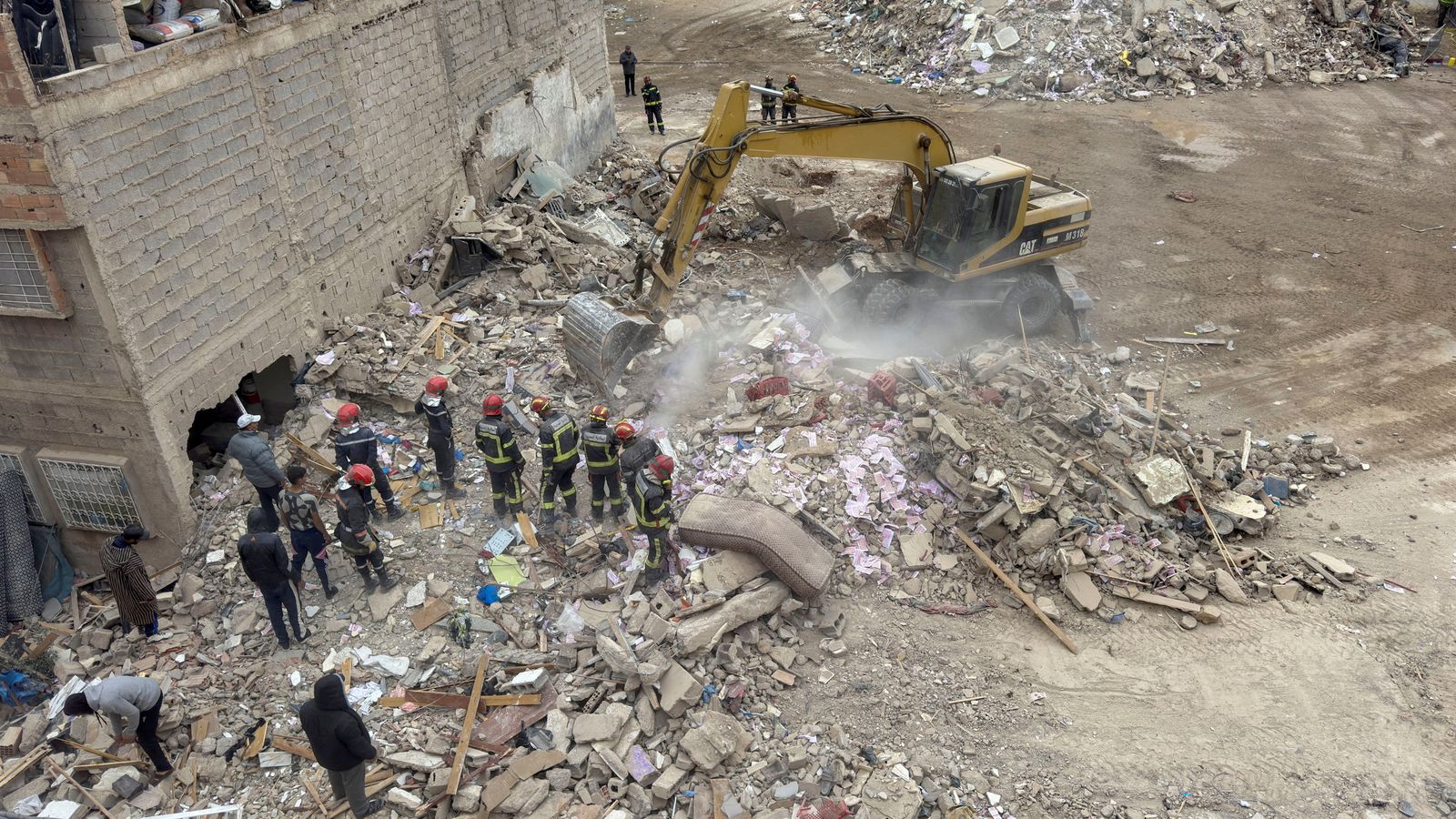 Rescuers work at the site of the collapse in Fez. Pic: Reuters